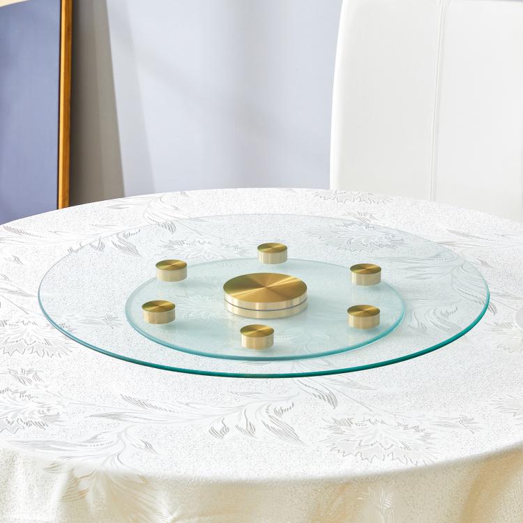 Tabletop.Two-tier, rotating round glass top.The diameter of the upper glass section is 61 cm, and the lower is 38 cm.The rotating design makes it easier to pick up and set down items.