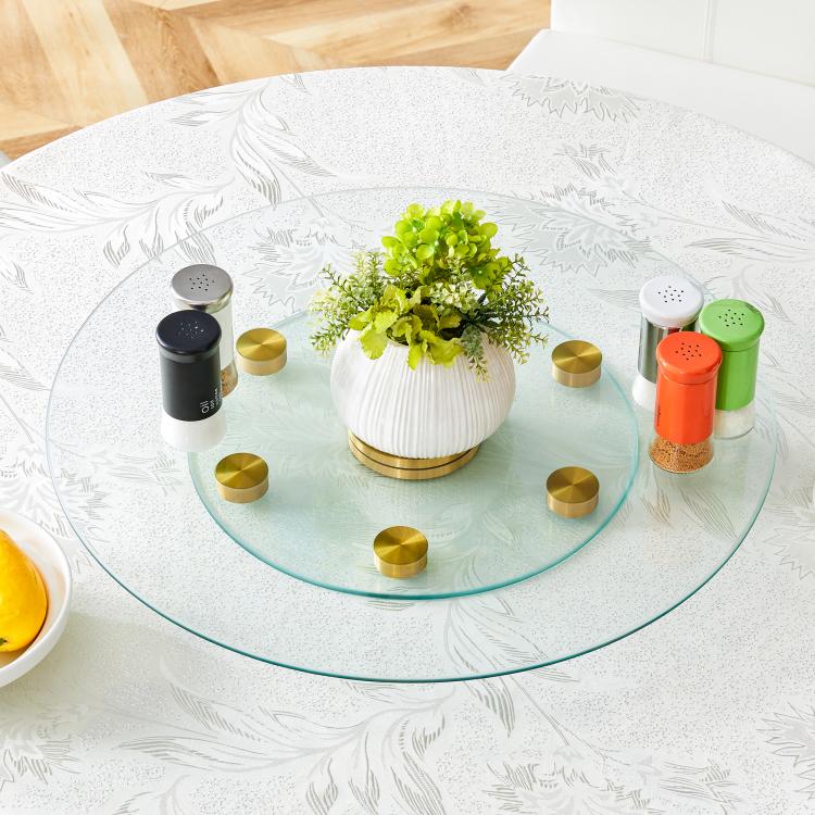 Tabletop.Two-tier, rotating round glass top.The diameter of the upper glass section is 61 cm, and the lower is 38 cm.The rotating design makes it easier to pick up and set down items.