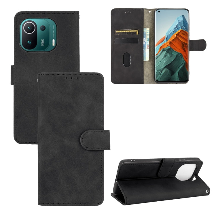 Solid Color Skin Feel Magnetic Buckle Horizontal Flip Calf Texture PU Leather Case with Holder & Card Slots & Wallet