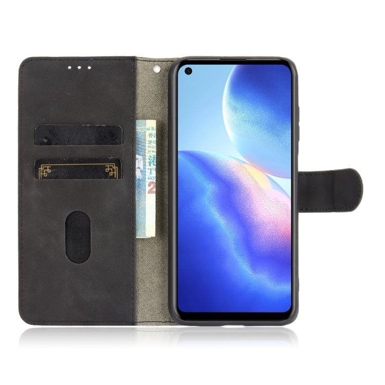 Solid Color Skin Feel Magnetic Buckle Horizontal Flip Calf Texture PU Leather Case with Holder & Card Slots & Wallet