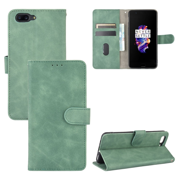 Solid Color Skin Feel Magnetic Buckle Horizontal Flip Calf Texture PU Leather Case with Holder & Card Slots & Wallet