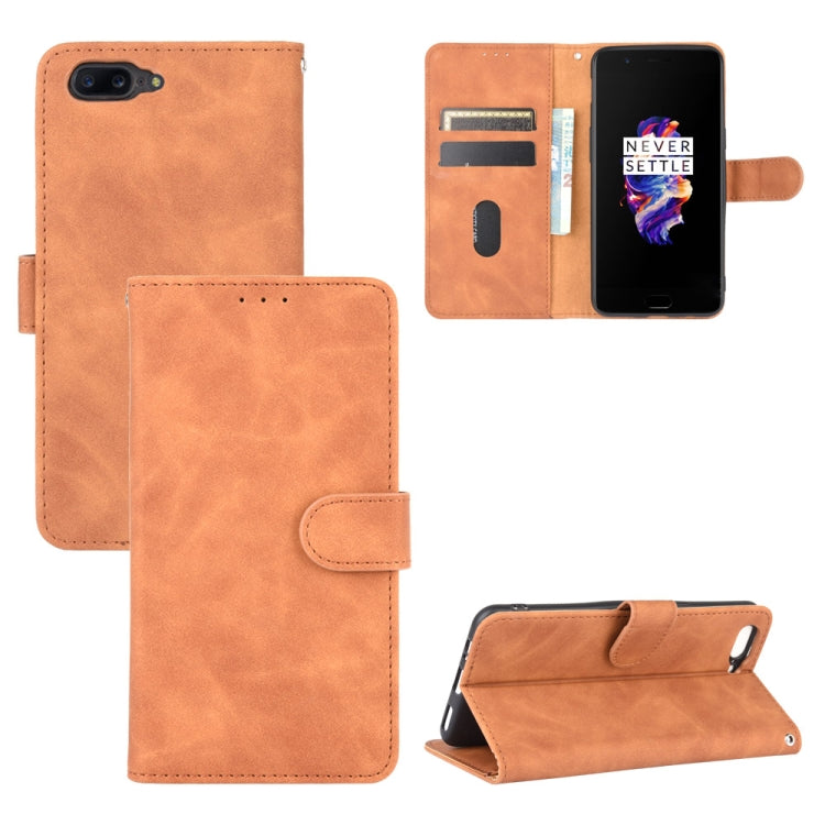 Solid Color Skin Feel Magnetic Buckle Horizontal Flip Calf Texture PU Leather Case with Holder & Card Slots & Wallet