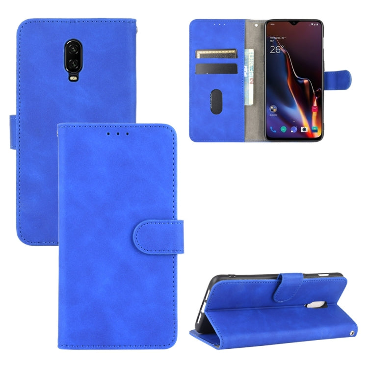 Solid Color Skin Feel Magnetic Buckle Horizontal Flip Calf Texture PU Leather Case with Holder & Card Slots & Wallet