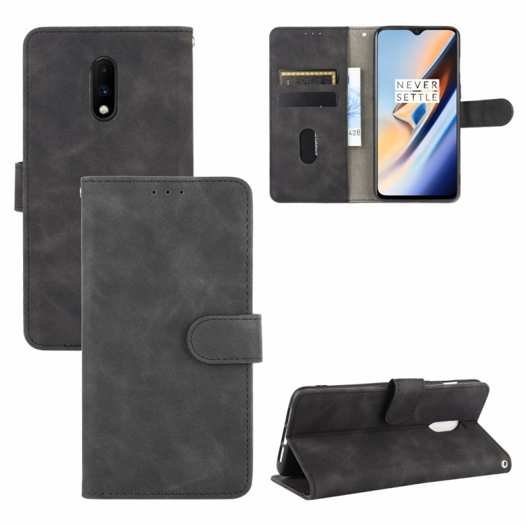 Solid Color Skin Feel Magnetic Buckle Horizontal Flip Calf Texture PU Leather Case with Holder & Card Slots & Wallet