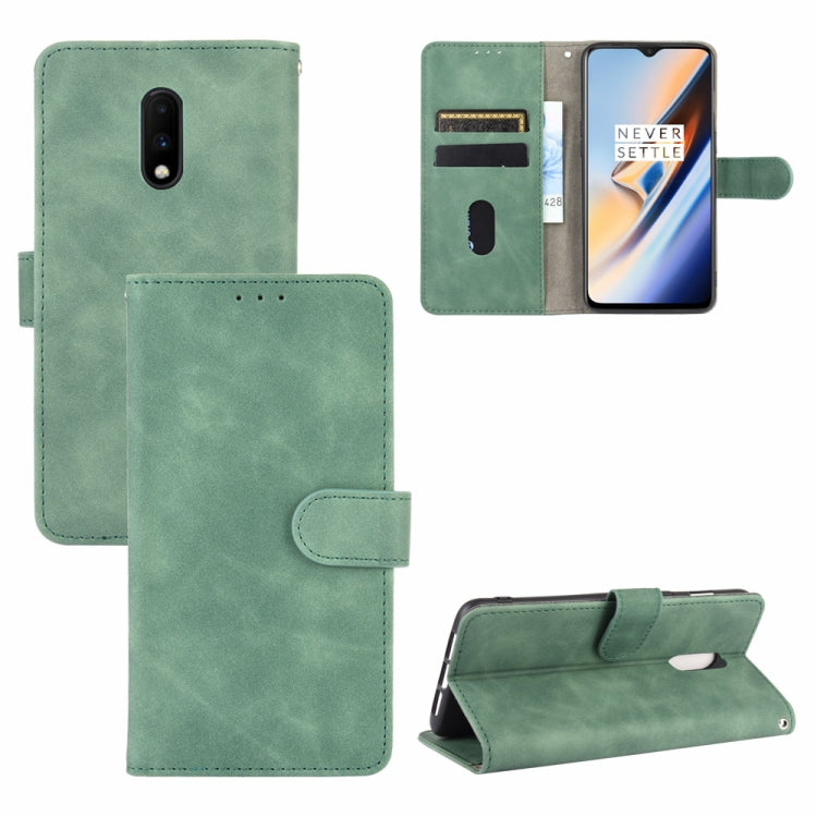 Solid Color Skin Feel Magnetic Buckle Horizontal Flip Calf Texture PU Leather Case with Holder & Card Slots & Wallet