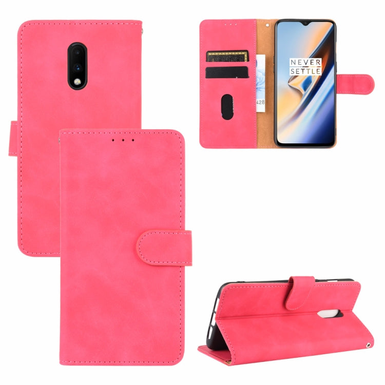 Solid Color Skin Feel Magnetic Buckle Horizontal Flip Calf Texture PU Leather Case with Holder & Card Slots & Wallet