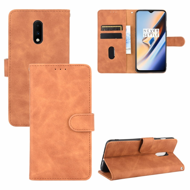 Solid Color Skin Feel Magnetic Buckle Horizontal Flip Calf Texture PU Leather Case with Holder & Card Slots & Wallet