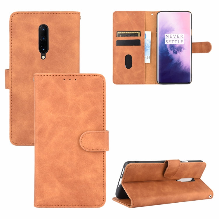 Solid Color Skin Feel Magnetic Buckle Horizontal Flip Calf Texture PU Leather Case with Holder & Card Slots & Wallet