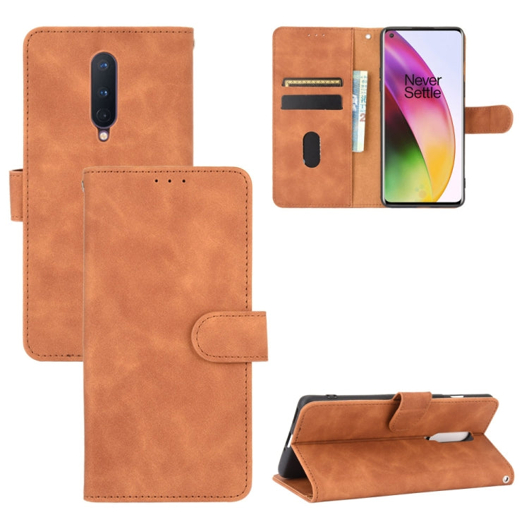 Solid Color Skin Feel Magnetic Buckle Horizontal Flip Calf Texture PU Leather Case with Holder & Card Slots & Wallet