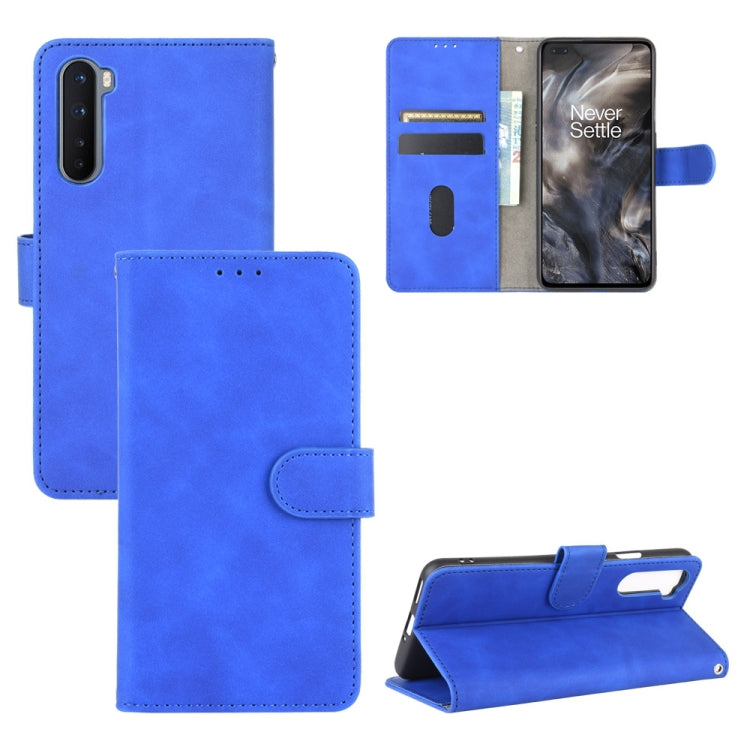Solid Color Skin Feel Magnetic Buckle Horizontal Flip Calf Texture PU Leather Case with Holder & Card Slots & Wallet