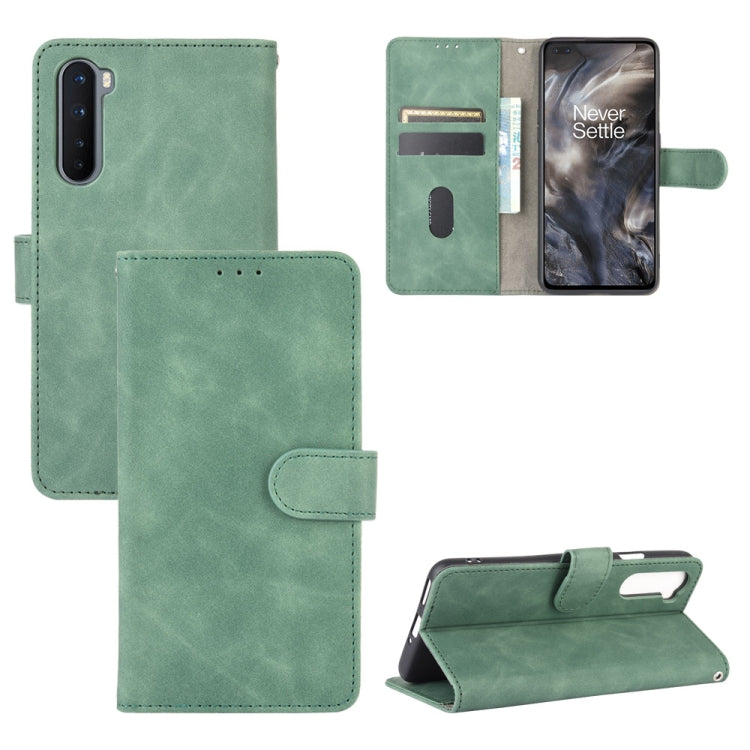 Solid Color Skin Feel Magnetic Buckle Horizontal Flip Calf Texture PU Leather Case with Holder & Card Slots & Wallet