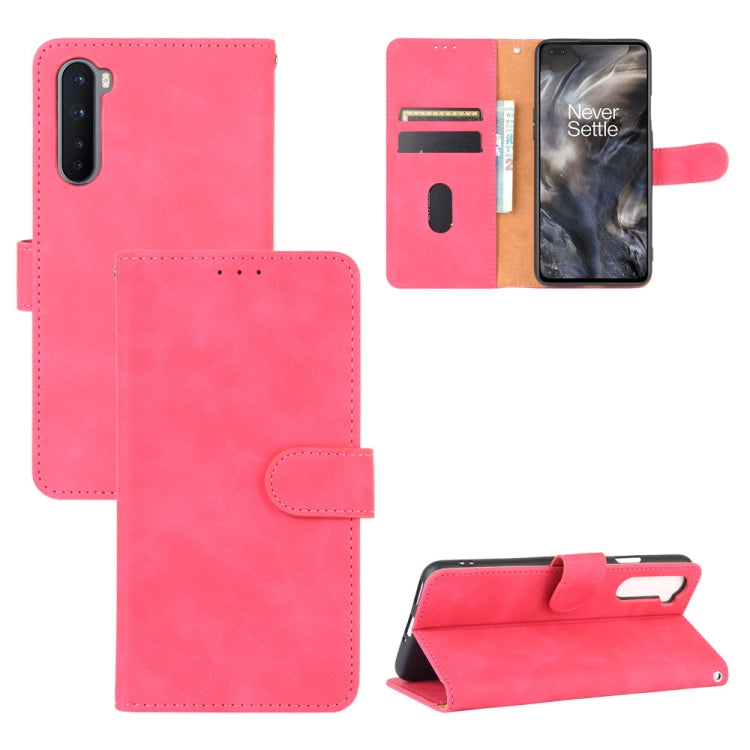 Solid Color Skin Feel Magnetic Buckle Horizontal Flip Calf Texture PU Leather Case with Holder & Card Slots & Wallet