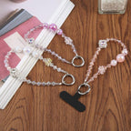 Four-Leaf Clover Beaded Phone Charm Wrist Strap with Tether Pad for Women Girls — Purple