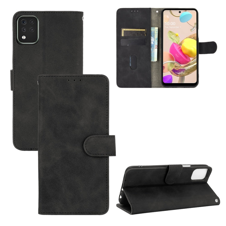 Solid Color Skin Feel Magnetic Buckle Horizontal Flip Calf Texture PU Leather Case with Holder & Card Slots & Wallet
