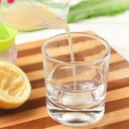 Multi-function Manual Mini Lemon Juicer with a Graduation Cup Juicer — view 6