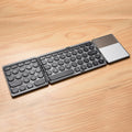 GK408 Three-fold Rechargeable Wireless Bluetooth Keyboard with Touchpad, Support Android / IOS / Windows