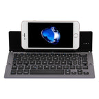 F18 Ultra-slim Rechargeable Foldable 58 Keys Bluetooth Wireless Keyboard with Holder — Grey