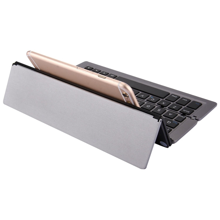 F18 Ultra-slim Rechargeable Foldable 58 Keys Bluetooth Wireless Keyboard with Holder — Rose Gold