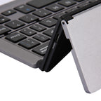 F18 Ultra-slim Rechargeable Foldable 58 Keys Bluetooth Wireless Keyboard with Holder — view 7