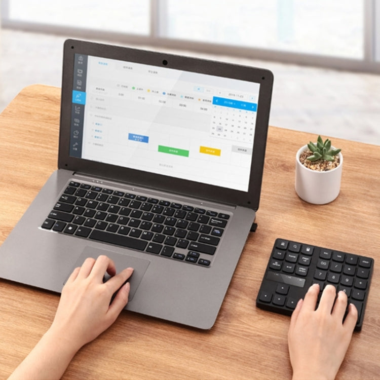 2.4G USB Wireless Numeric Keypad 35 Keys Charging Digital Keyboard Notebook Laptop Mini Numpad — view 5