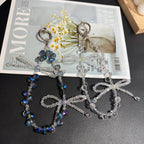 Woven Bow Iridescent Crystal Phone Chain — Blue