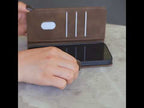 For iPhone Duo Solid Color Calfskin Texture RFID Vegan Leather Phone Case(Black) - YouTube Video