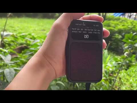 W-209 Mini Portable Rechargeable / Battery Dual-mode Powered Pointer FM Radio with Flashlight(Black) - YouTube Video